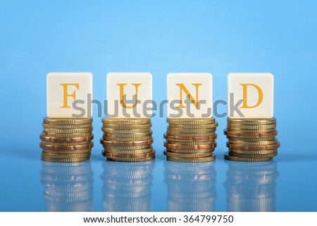 The word Fund on stacked coins, finance conceptual