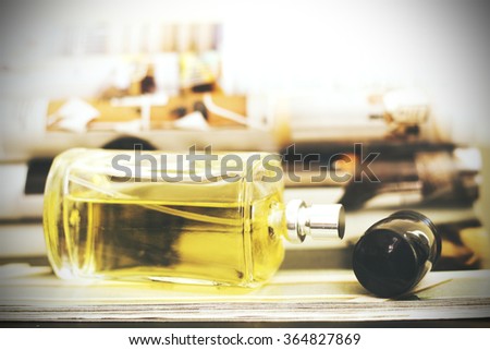 Perfume bottle with blurred magazine background