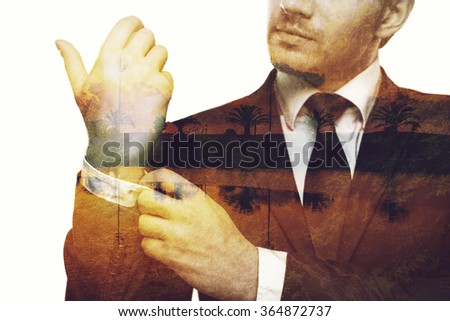 Popping memories. Digitally composed close-up picture of young businessman adjusting his sleeve over the picture of landscape with palm trees