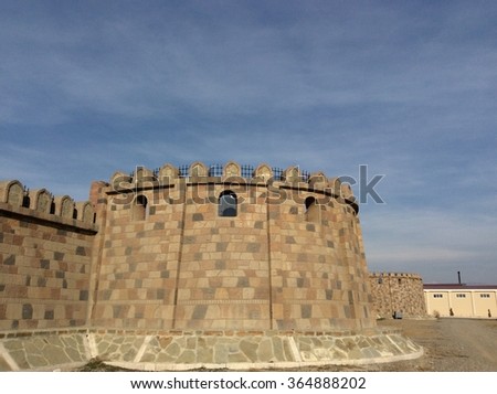 High ancient castle walls front
