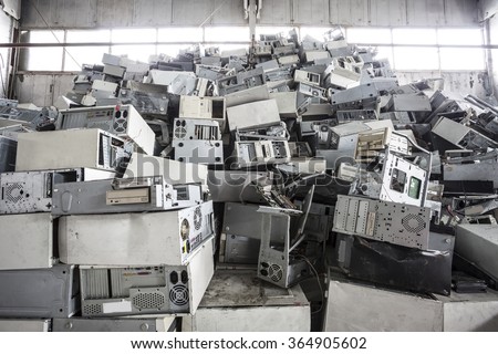 Old computers dump on jubkyard Royalty-Free Stock Photo #364905602