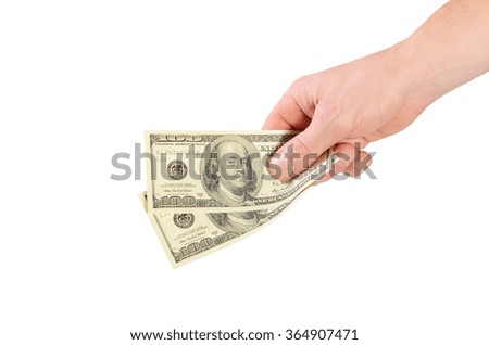 Dollars in man hand isolated on white 