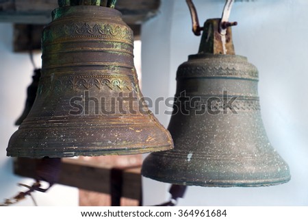 Cast-iron ancient bells of orthodox church, close up
