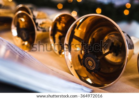 Handbells close up with sheet of notes Royalty-Free Stock Photo #364972016