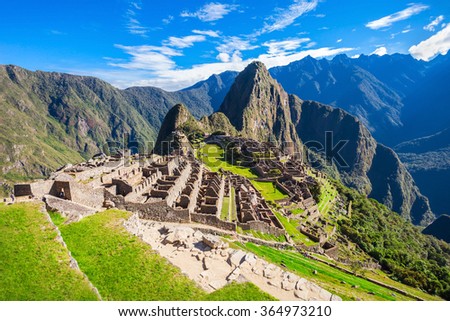 View of the Lost Incan City of Machu Picchu near Cusco, Peru. Machu Picchu is a Peruvian Historical Sanctuary and a UNESCO World Heritage Site. Machu Picchu is  located in the Cusco Region in Peru. Royalty-Free Stock Photo #364973210