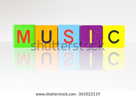 Music - an inscription from children's wooden blocks