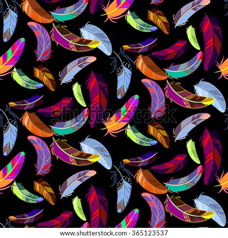 Vector seamless pattern with colored feathers on a black background. It can be used for fabric or wrapping paper.
