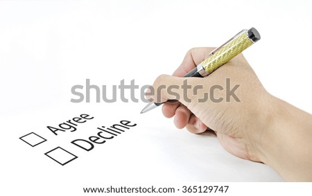 Hand using a classic pen decide to choice accept or decline