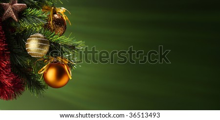 A particular of a Christmas tree with decorations