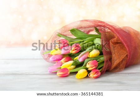 bouquet of tulips on the table Royalty-Free Stock Photo #365144381
