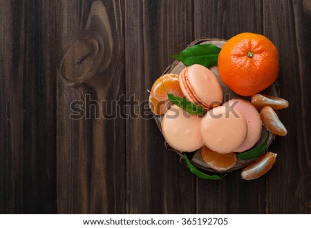 French macaroons with tangerine. Selective focus, top view