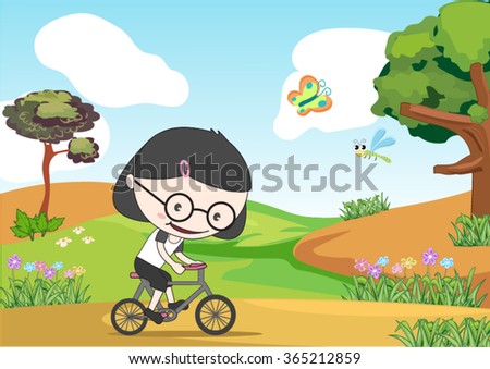 girl riding a bike in the garden