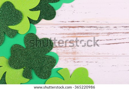 Shamrock. Clover leaves on wood background. St. Patrick's Day