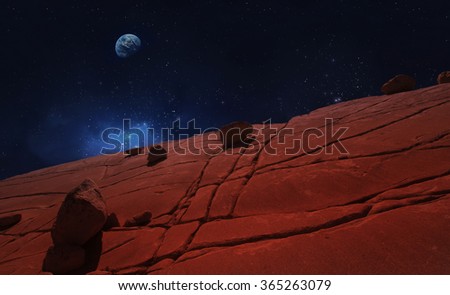 Rocks on the surface of the Red Planet Mars, stars in the space and planet Earth