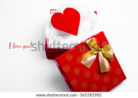 Open red box with valentine heart on white background
