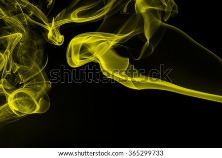 Yellow smoke abstract dark background