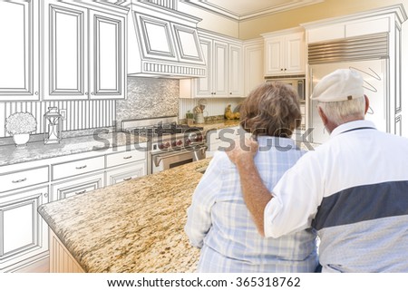 Senior Couple Looking Over Custom Kitchen Design Drawing and Photo Combination.
