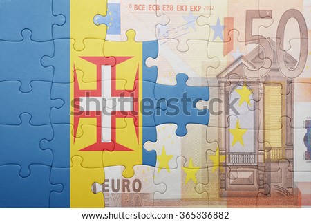 puzzle with the national flag of madeira and euro banknote . concept