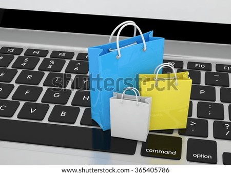laptop and  shopping bags on white background