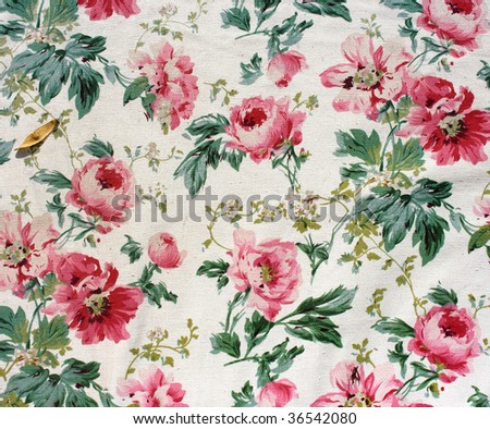 Fragment of colorful retro tapestry textile pattern with floral ornament and flowers useful as background
