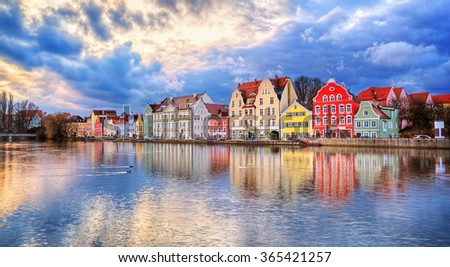 Colorful historical houses on Isar river in an old gothic town Landshut by Munich, Germany Royalty-Free Stock Photo #365421257
