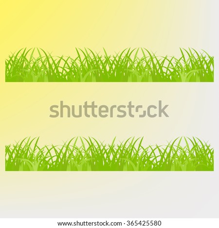 Green grass on a yellow  background