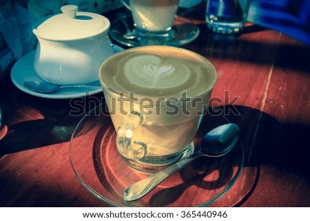 Closeup of a cup of coffee. vintage style effect picture