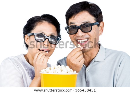 Couple watching a 3d movie on white background