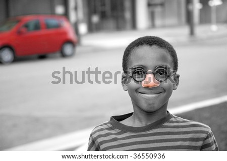 boy clowning around in a disguise