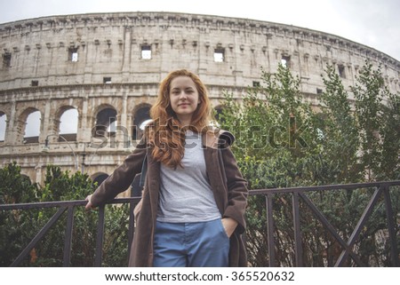 girl on the background of the Colosseum