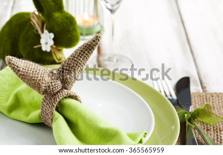 Easter table setting with green bunny decoration
