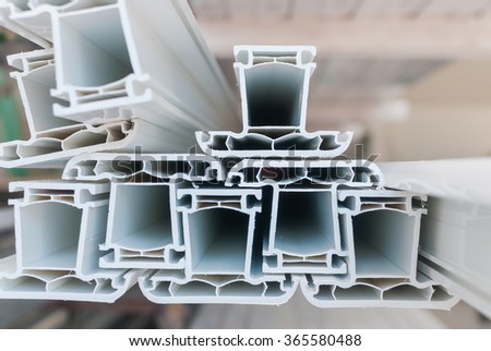 Extruded Plastic Profiles Systems for Windows and Doors Manufacturing Royalty-Free Stock Photo #365580488