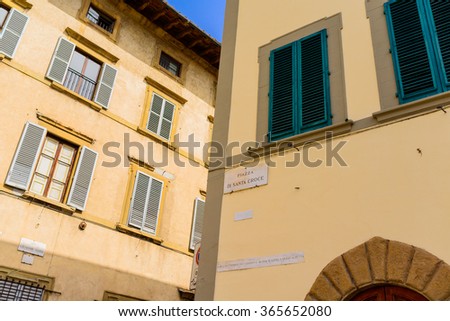 old street with historical buildings in florence, Italy