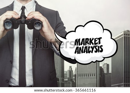 Market analytics text on speech bubble with businessman holding binoculars