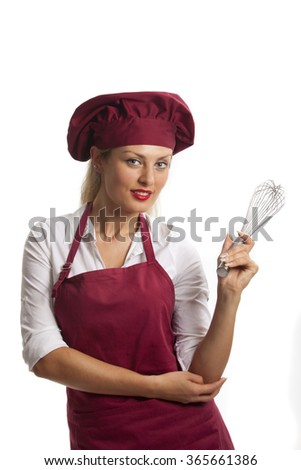 female chef with a beater 