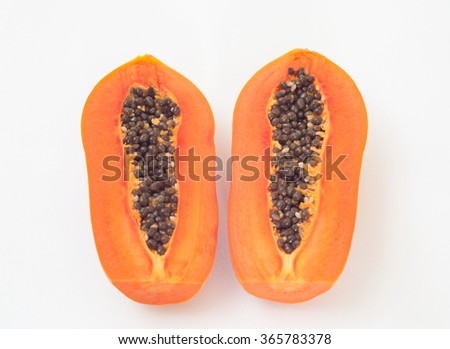 papaya slice on white background.
