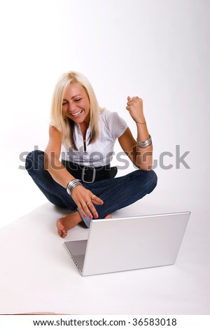 Successful and happy woman with a laptop