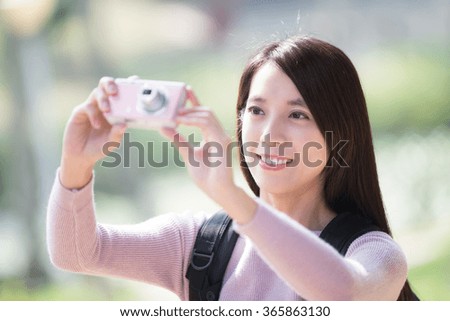 young woman traveler happy smile take selfie. nature green background, asian beauty