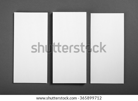 Blank flyer over grey background 