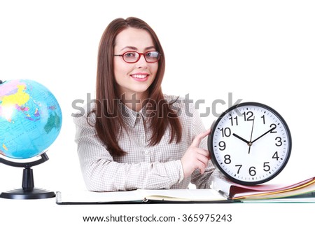 Picture of young woman student is holding in hands clock
