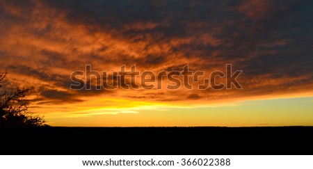 Red and yellow sunset  over Grand Canyon mountains
