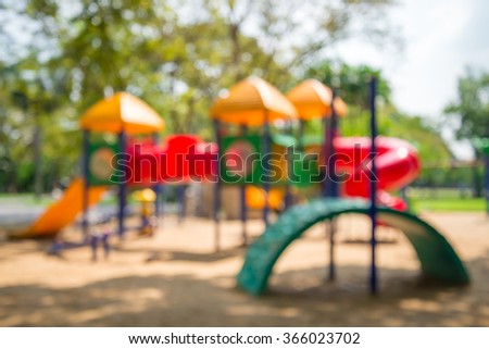 Abstract blur children playground in city park background