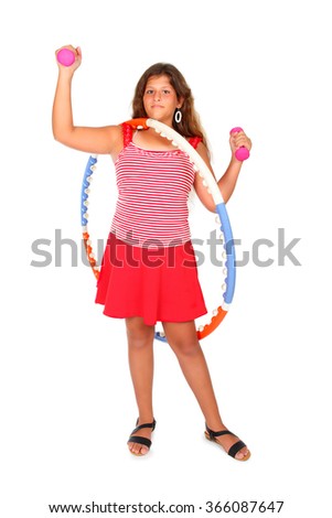 young girl with a hula hoop and pink dumbbells on white background 