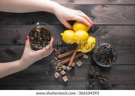 Woman hold in hands glass cup herbal tea