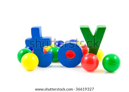 Word Toy in wooden colorful letters with colored balls, isolated on white background