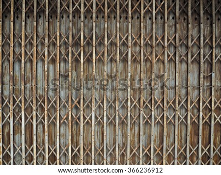 The rusty steel door background.
