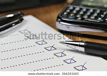 completed checklist in office Royalty-Free Stock Photo #366261665