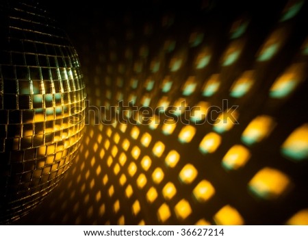 Disco ball with reflection on the wall