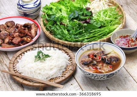 bun cha, grilled pork rice noodles and herbs, vietnamese cuisine Royalty-Free Stock Photo #366318695