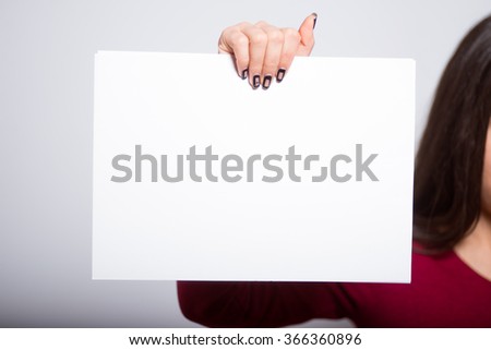 girl holding a blank inscriptions isolated